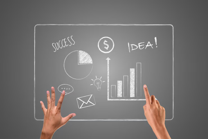 Hands pointing at successful graphs written with white chalk, draw concept.