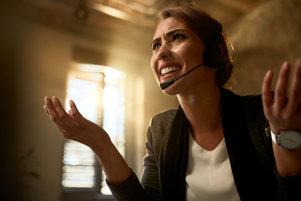 Below view of upset businesswoman having some problems while working in the office.