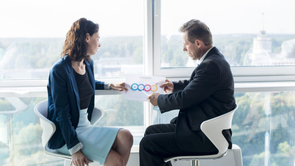 businessman-explaining-chart-his-female-colleague remote sales team