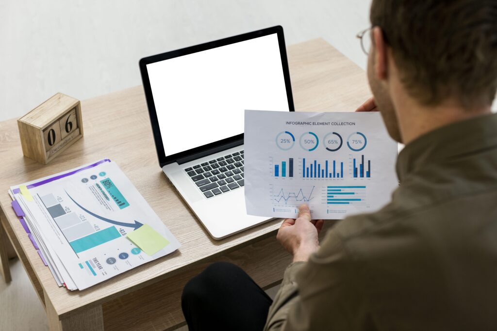 man-working-with-infographics-indoors remote sales team